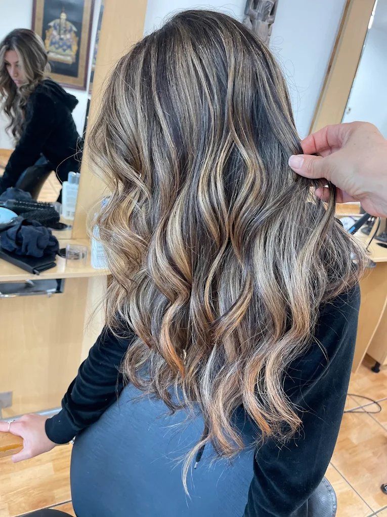 Dimensional brunette balayage with warm blonde ribbons, San Diego